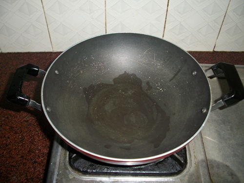 heat oil in a kadai