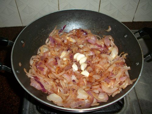 add in garlic cloves