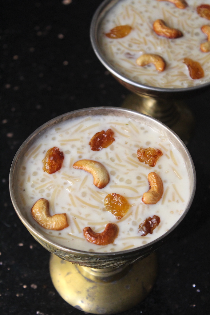 Close look semiya payasam served in two bowls with fried cashews and raisins garnish