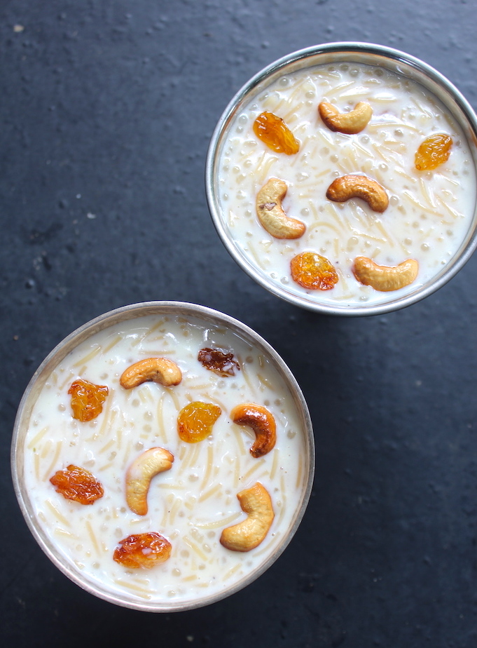 Top angle semiya payasam served in two bowls with fried cashews and raisins garnish