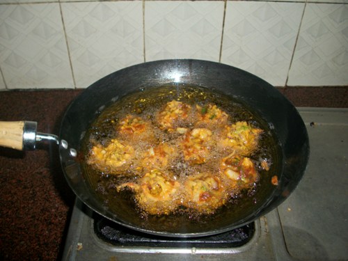 drop vada in hot oil and fry till golden