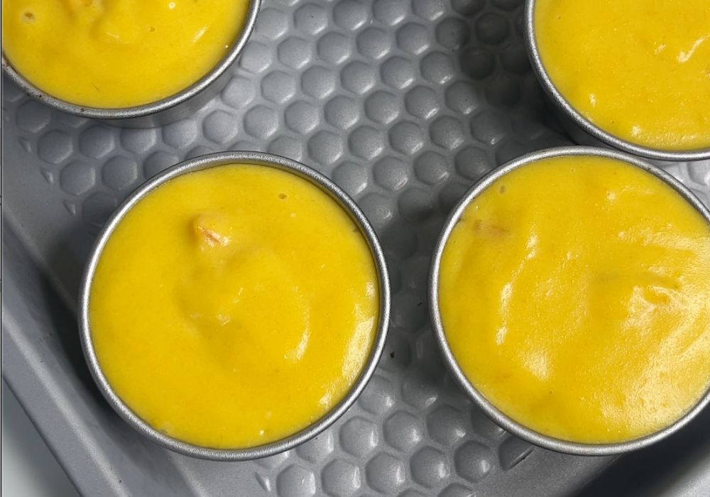mango pudding set in fridge