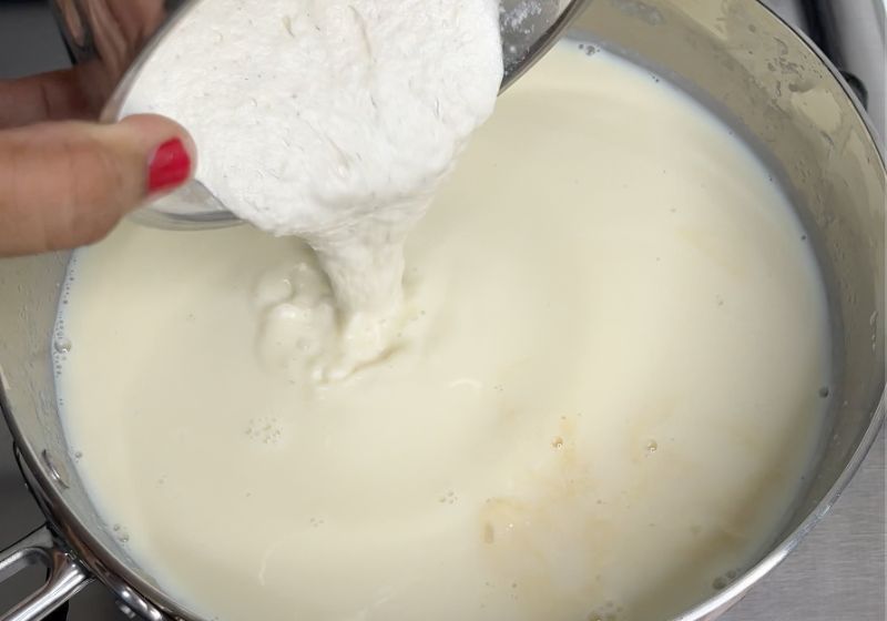 add almond paste to milk