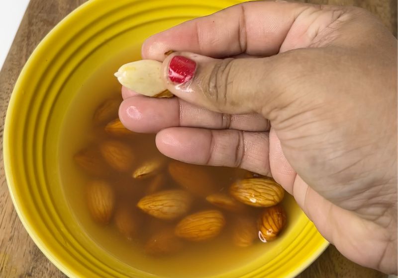 peel skins of almonds