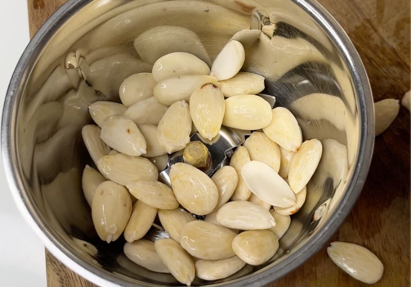 take blanched almonds in a blender