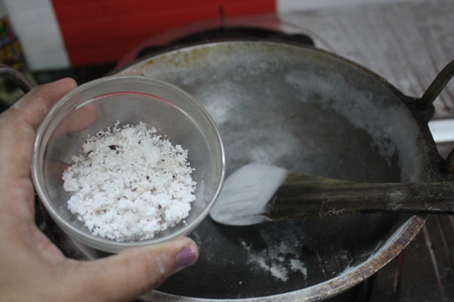 freshly grated coconut taken in a kadai