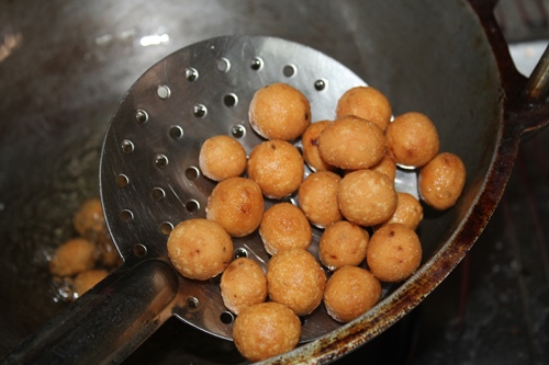 seedai fried and strained using slotted spoon