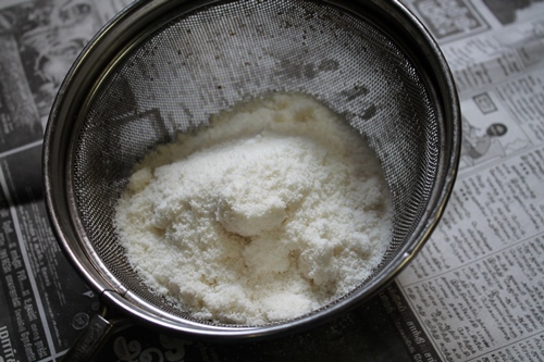 homemade rice flour taken in a sifter to sieve