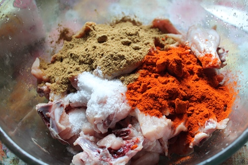 add salt, coriander powder and chilli powder in chicken