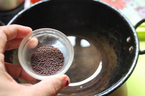 add mustard seeds to hot oil for tempering