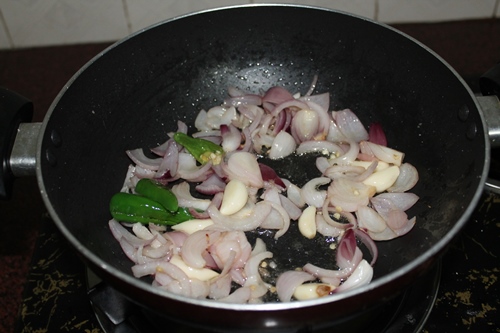cook onions till lightly golden
