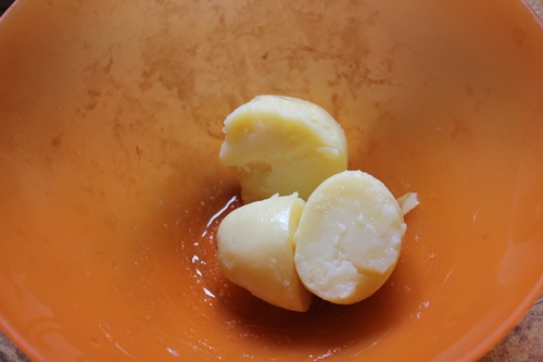 boiled potatoes taken in a bowl