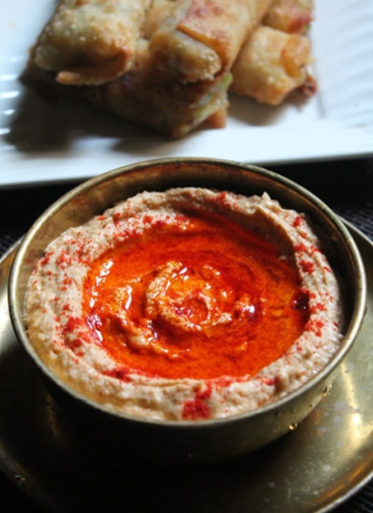 hummus with olive oil and paprika on top