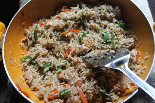 chicken fried rice in a wok