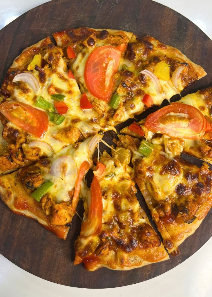 https://www.yummytummyaarthi.com/wp-content/uploads/2015/11/chicken-pizza-2-731x1024.jpeg