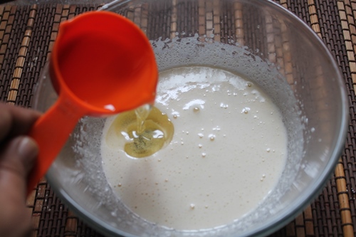 oil is added into the whipped eggs and sugar