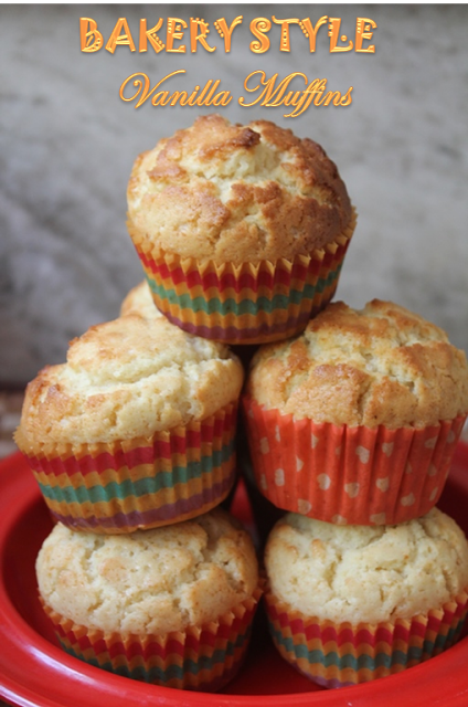 vanilla muffins with perfect muffin tops stacked on a red plate