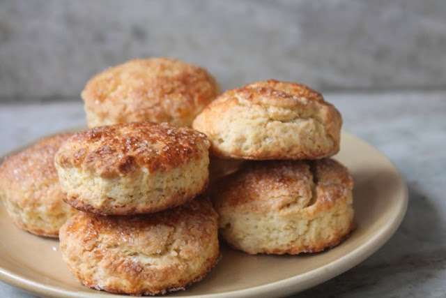 buttery scones stacked on top 