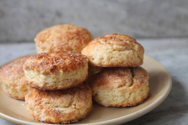 buttery scones stacked on top