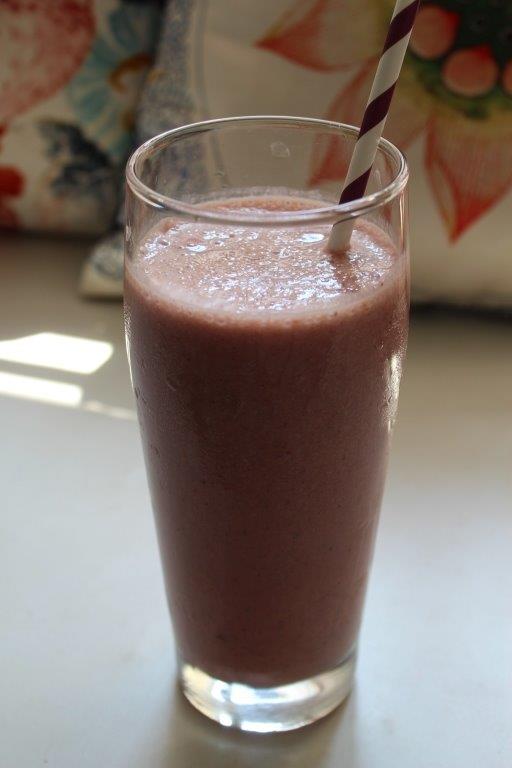 Strawberry Banana Smoothie with a straw