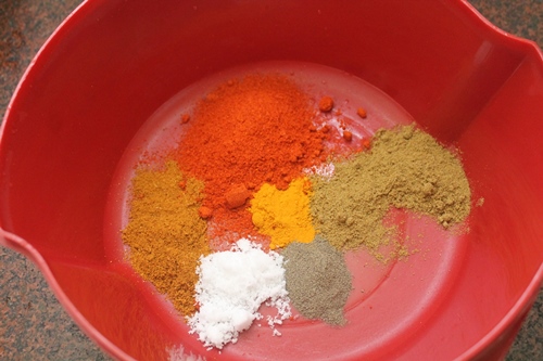 take spice powder in a bowl