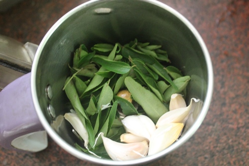take ginger, garlic and curry leaves
