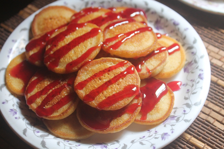 eggless pancakes stacked on a plate