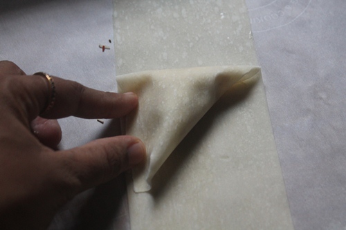 folding samosa for making cheese samosa