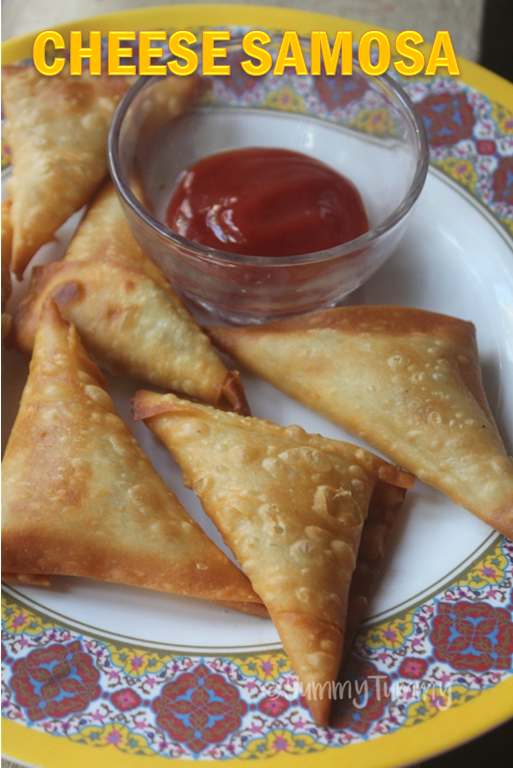 cheese samosa served with tomato ketchup