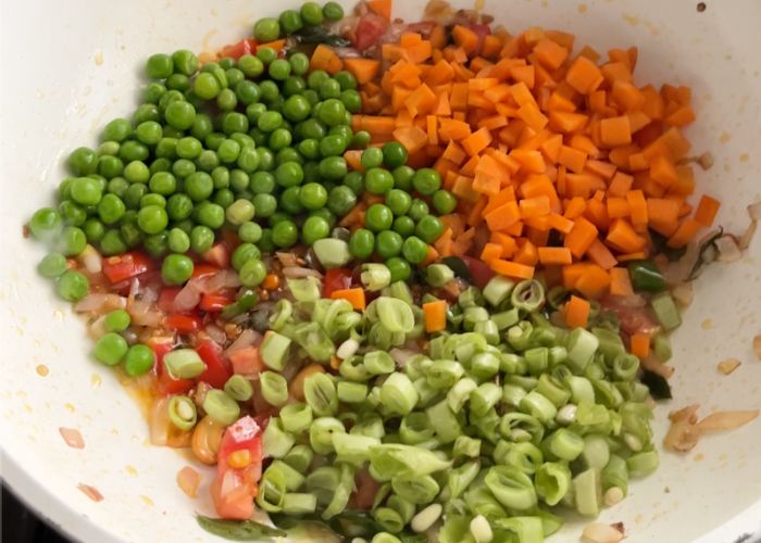 add carrots, peas and green beans