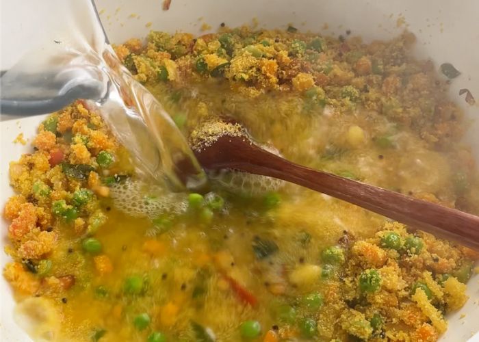 pour in hot boiling water into the sooji