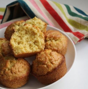 orange muffins cut in half and texture shown