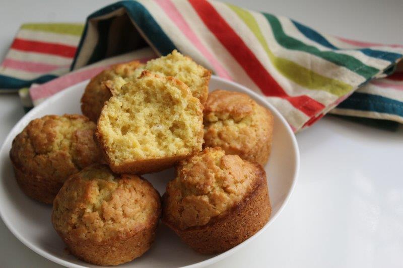 orange muffins cut in half and texture shown