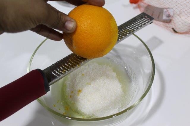 zest an orange using a  micro plane zester