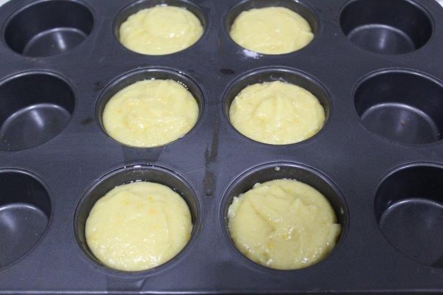 fill muffin mould with ice cream scoop
