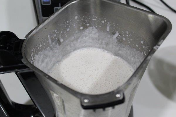 Grind coconut and rice into paste