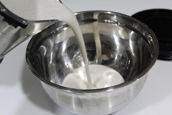 pour Vattayappam batter in a bowl