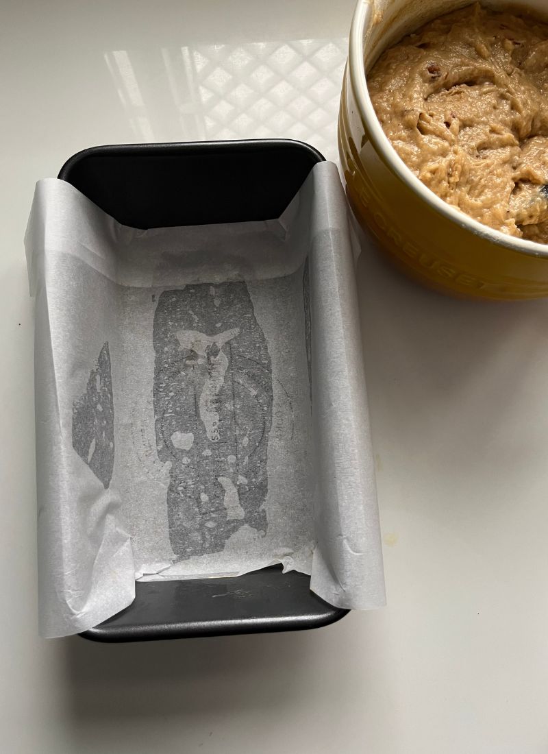 loaf pan prepared with parchment paper