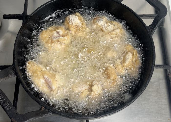 drop chicken in hot oil