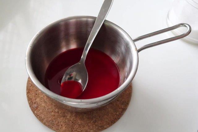 strawberry juice in a sauce pan