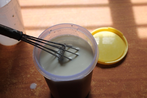 mix curd and milk together