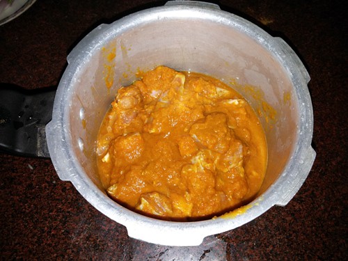 take marinated mutton in a pressure cooker