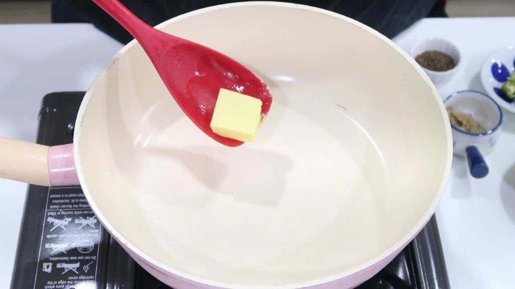 melt butter in pan for paneer butter masala