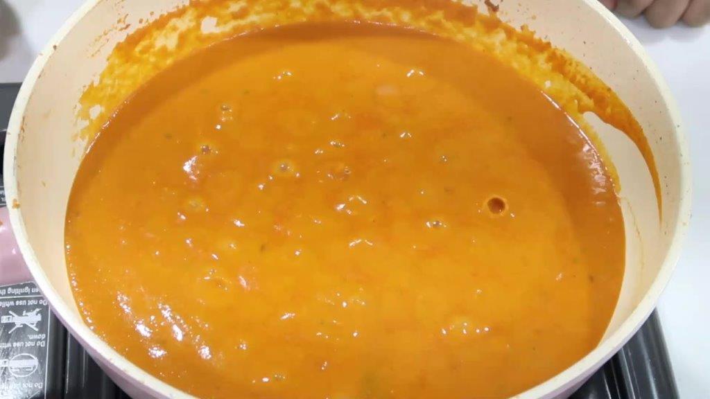 paneer butter masala curry simmering shot