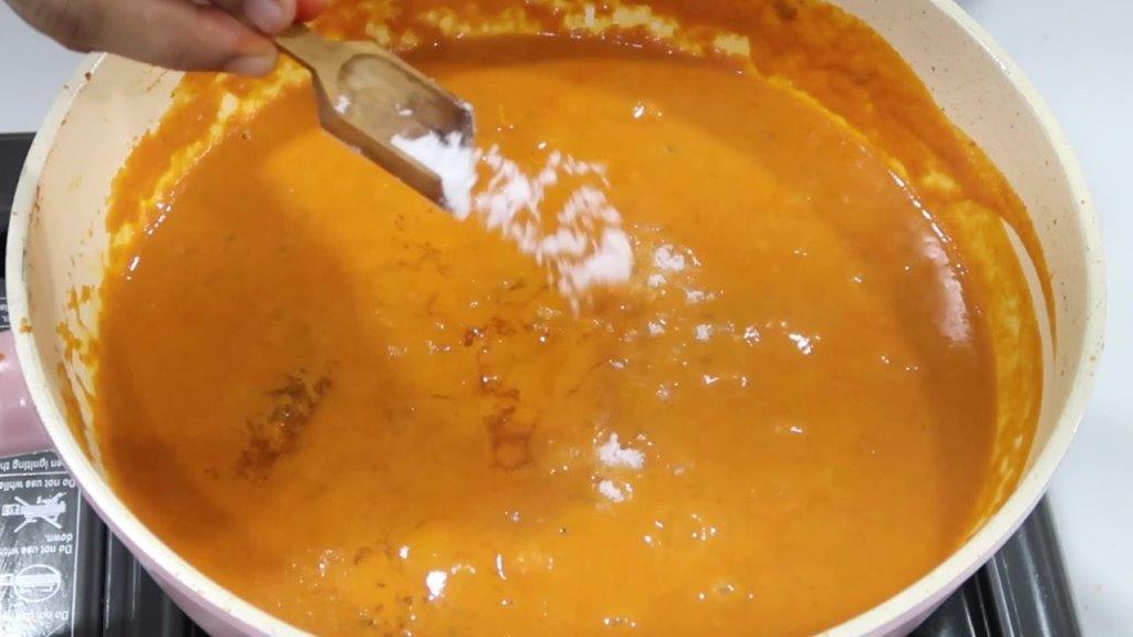 add salt paneer butter masala curry simmering shot