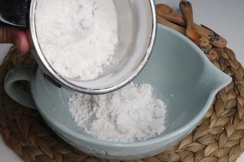take powdered sugar in a bowl