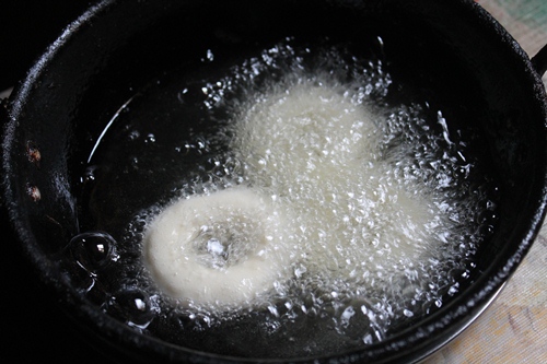 drop doughnuts in oil
