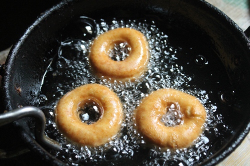 flip doughnuts and cook