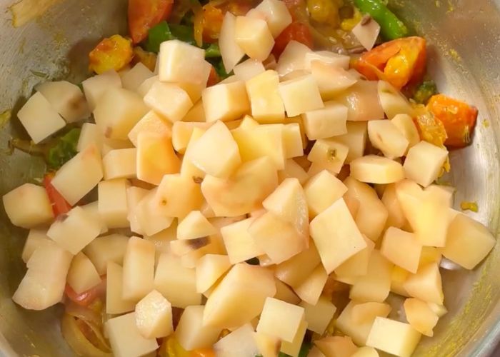 add in peeled and chopped potatoes