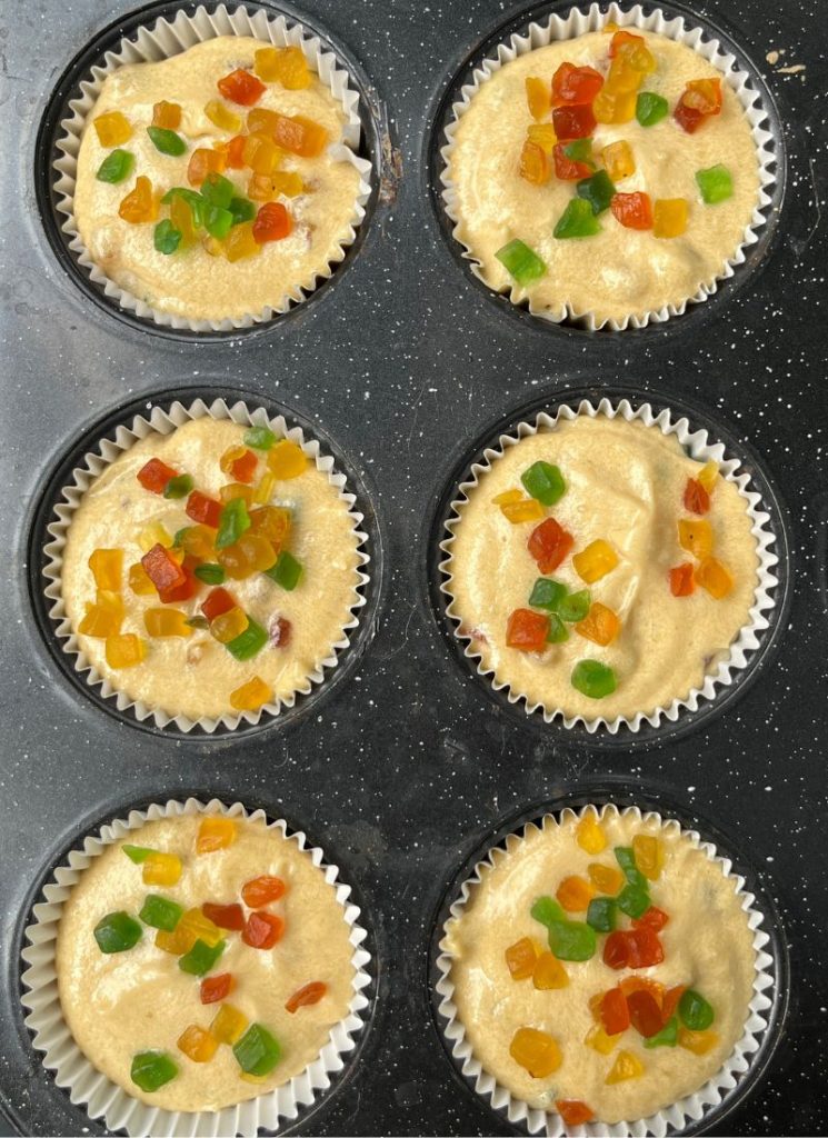 tutti frutti muffin batter filled in mould